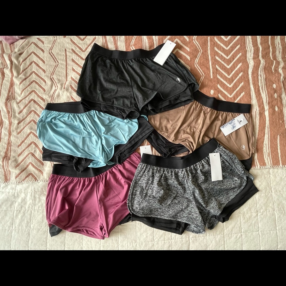 FIVE PAIRS OF ATHLETIC SHORTS